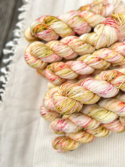 Pina Colada - Iridescent Sparkle DK 100g skein
